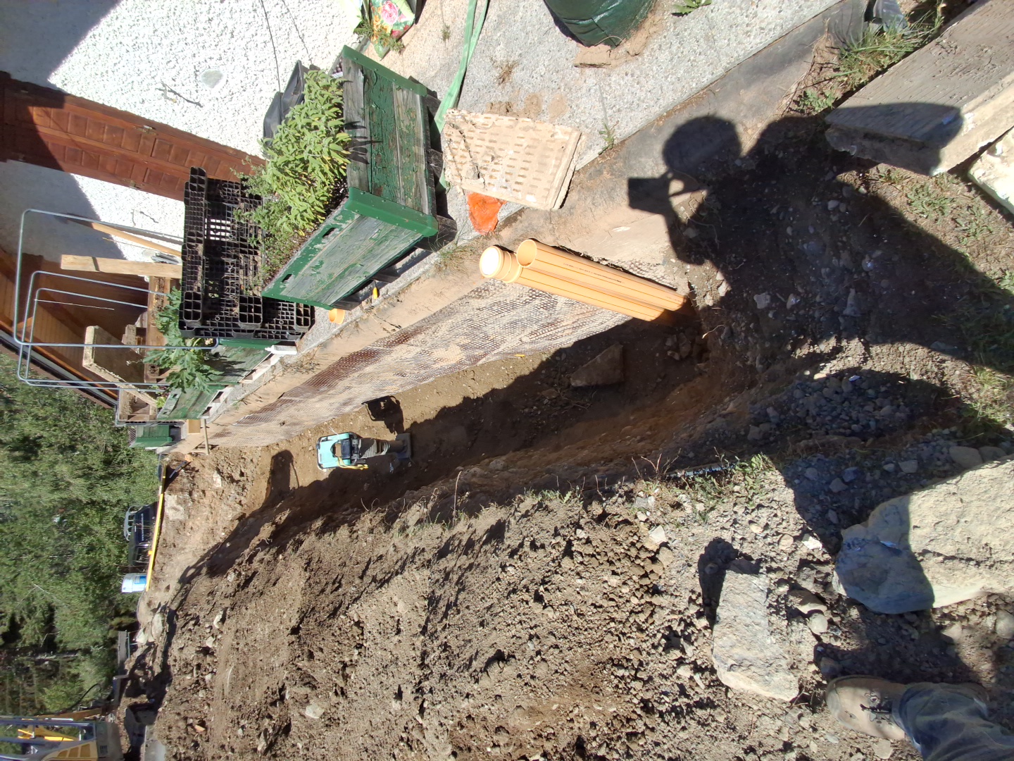 Remblayage sur le drainage et compactage.